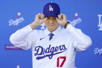 Ohtani, who will be entering his seventh MLB season next year, recently signed as a free agent with the Los Angeles Dodgers for $700 million over 10 years. | AP / via Kyodo 