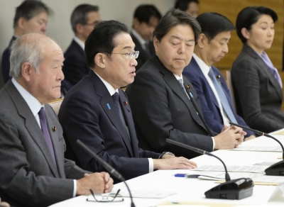 Prime Minister Fumio Kishida speaks during a policy meeting on Friday. 