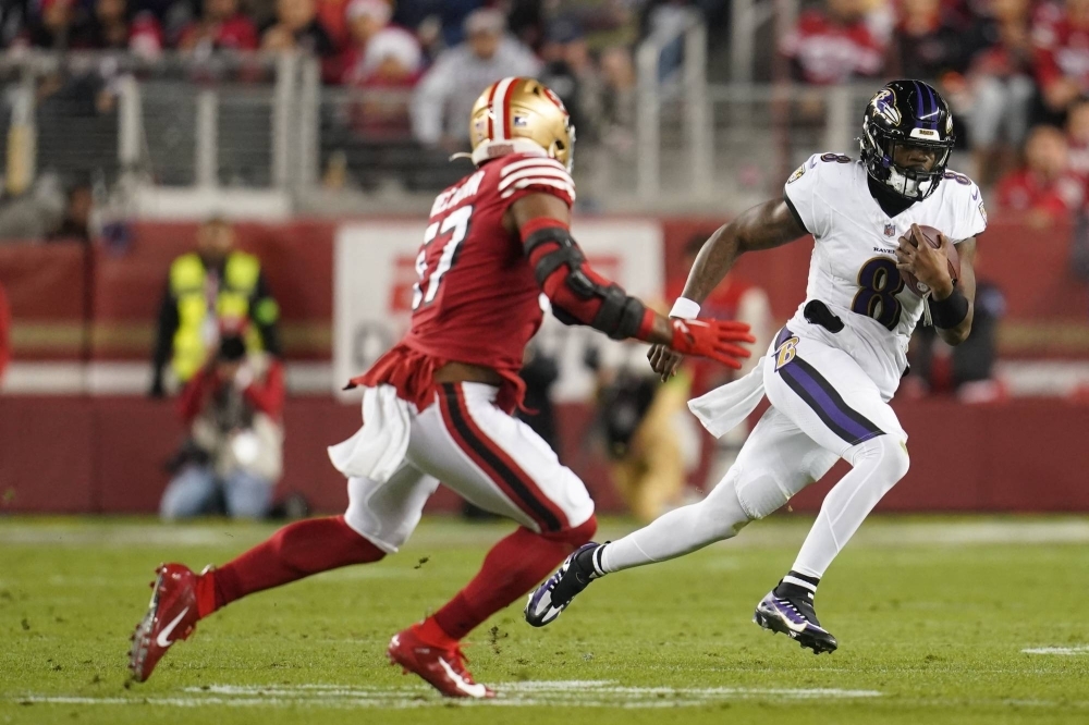 Ravens quarterback Lamar Jackson rushes during the first quarter of Baltimore's win over San Francisco on Monday in Santa Clara, California. 