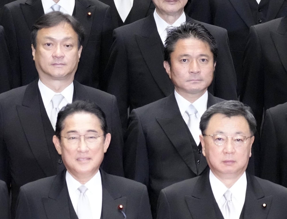 Lower House lawmaker Mito Kakizawa (back right) when he was appointed deputy justice minister in September