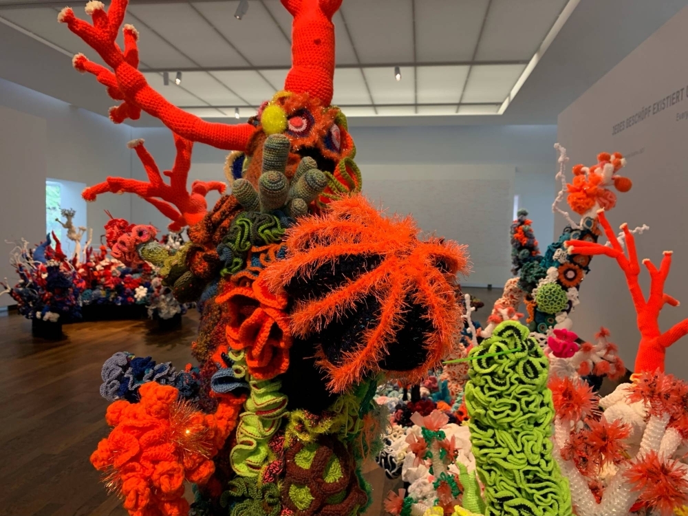 A colorful coral reef made out of wool to raise awareness about climate change, at a museum in Baden-Baden, Germany, in January 2022