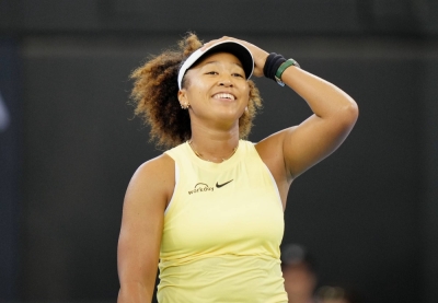Four-time Grand Slam champion Naomi Osaka smiles after beating Germany's Tamara Korpatsch 6-3 7-6(9) in the first round of the Brisbane International in Australia on Monday.