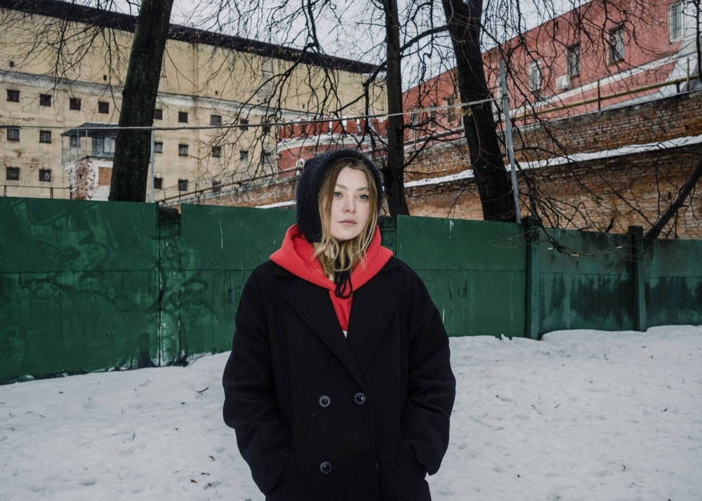 Aleksandra Popova, an activist whose husband was a co-defendant in Yegor Shtovba's trial, outside Butyrka prison in Moscow on Dec. 21. Shtovba, who has spent the past 15 months in pretrial detention, married Nadezhda Shtovba last month in a short ceremony in a prison in downtown Moscow.
