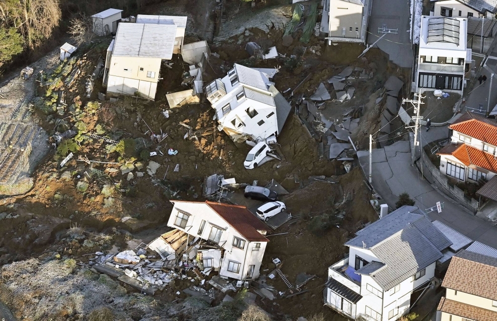 Collapsed buildings in the city of Kanazawa, Ishikawa Prefecture, on Tuesday, following the massive earthquake that struck the area on Monday