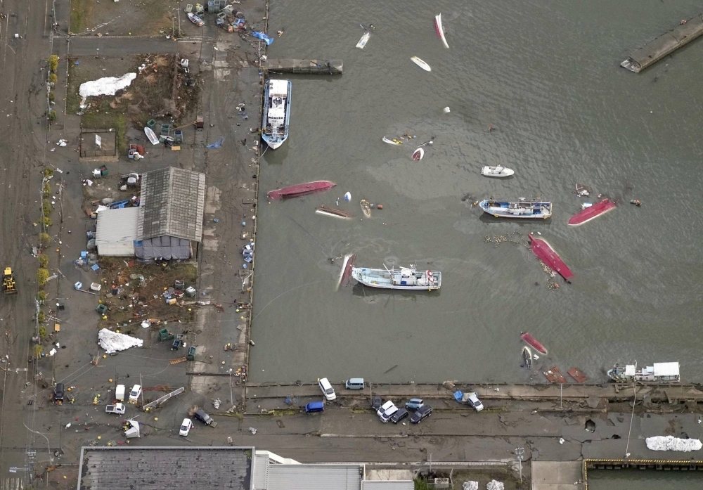 Capsized vessels in the harbor in the city of Suzu, Ishikawa Prefecture, on Tuesday