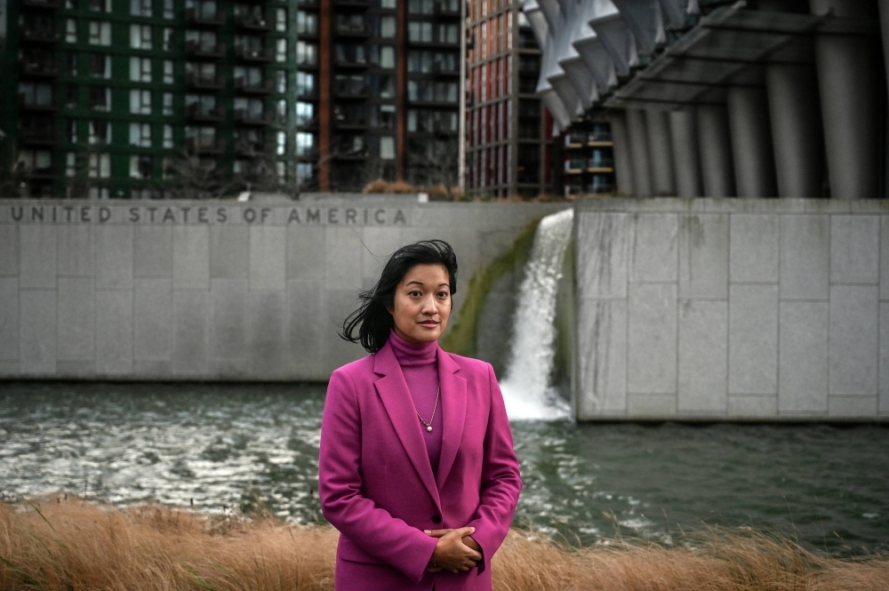Yuki Kondo-Shah beside the U.S. Embassy where she works in London on Dec. 22. As U.S.-China tensions rise, national security employees with ties to Asia say U.S. counterintelligence officers wrongly regard them as potential spies and unfairly ban them from jobs. 
