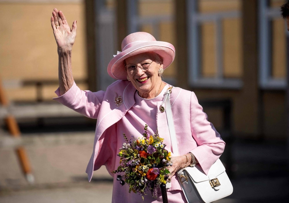 Queen Margrethe II of Denmark waves to onlookers on Sept. 1, 2023. Europe's longest-serving monarch said on Sunday that she would abdicate on Jan. 14 and pass the baton to her son Crown Prince Frederik.