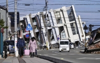 A collapsed building in Wajima, Ishikawa Prefecture, on Tuesday following Monday's earthquake  | Kyodo 
