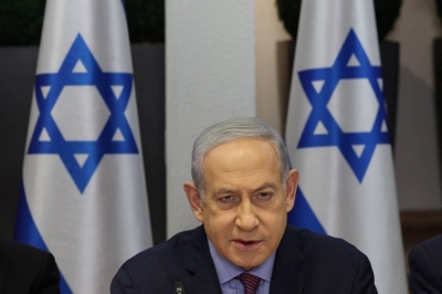 Israeli Prime Minister Benjamin Netanyahu attends the weekly cabinet meeting at the the Kirya military base in Tel Aviv on Sunday.