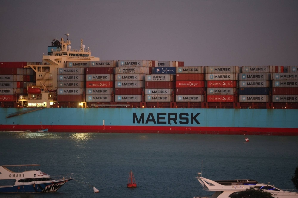 The Maersk Sentosa container ship sails southbound to exit the Suez Canal on Dec. 21. 