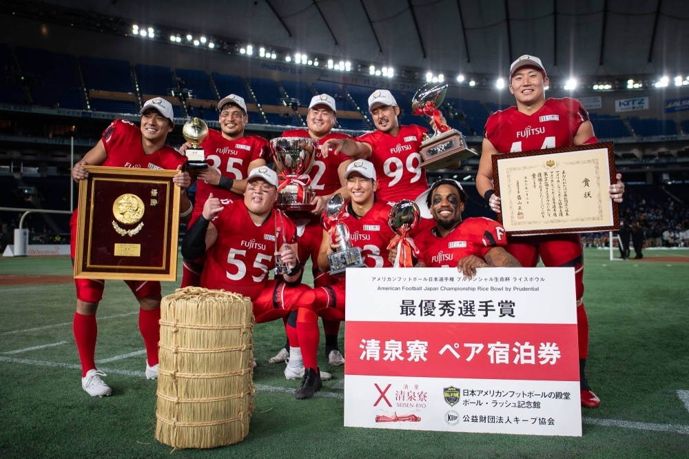 Frontiers players pose with their trophies after winning the Rice Bowl at Tokyo Dome on Wednesday.