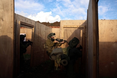 Israeli soldiers take part in a drill at the Israeli-occupied Golan Heights, amid the ongoing conflict between Israel and the Palestinian Islamist group Hamas, on Thursday