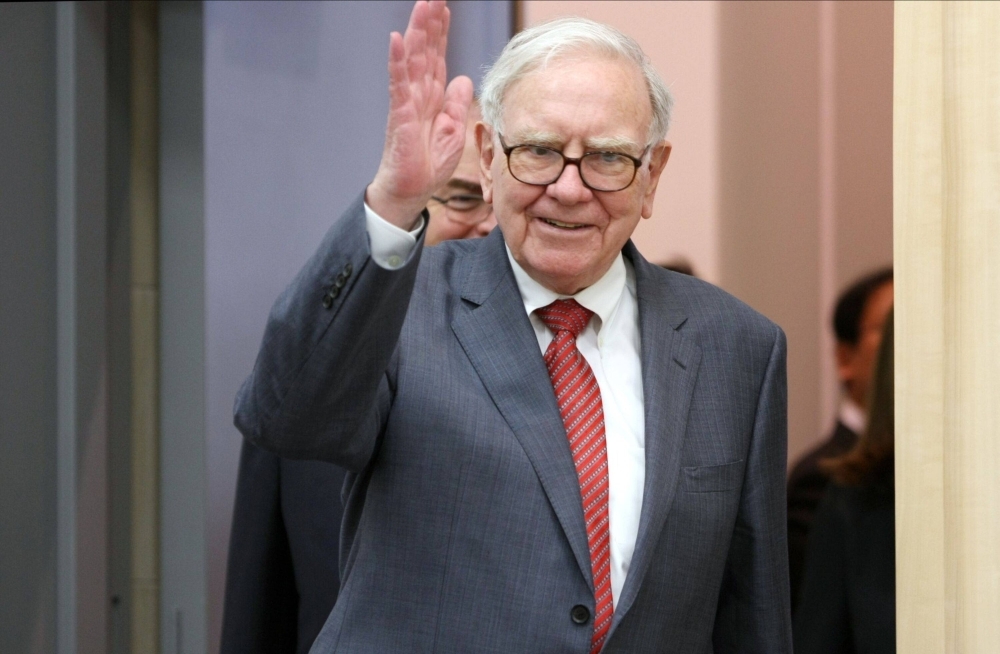 Warren Buffett, chairman and chief executive officer of Berkshire Hathaway, arrives for a news conference at the Tungaloy Corp.'s headquarters in Iwaki City, Fukushima Prefecture, in November of 2011. 