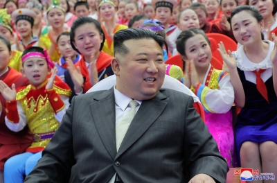 North Korean leader Kim Jong Un attends an event with students to celebrate the new year in Pyongyang in this undated picture released Tuesday.