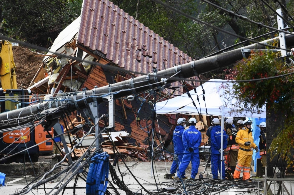Rescuers search for missing victims at a landslide site in the Kawashima district in the city of Anamizu, Ishikawa Prefecture, on Saturday after a major earthquake struck the Noto region on New Year's Day.