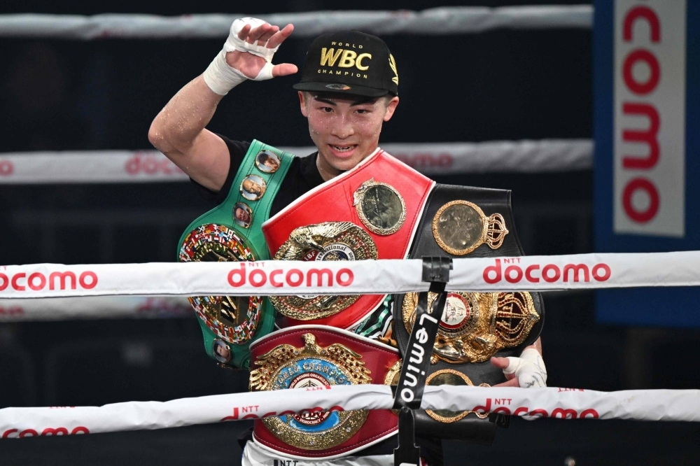 Japan's Naoya Inoue celebrates his victory over Marlon Tapales of the Philippines at Tokyo's Ariake Arena on Dec. 26. 