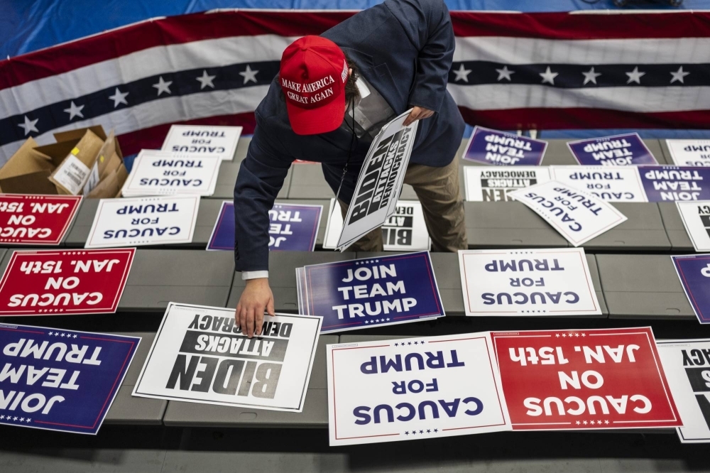 A supporter of Donald Trump prior to a campaign event in Cedar Rapids, Iowa, last month. Prime Minister Rishi Sunak signaled that voters in the United Kingdom will go to the polls in the fall, around the time that the United States will be in the midst of its own pivotal vote.