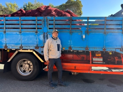Kotaro Seki, CEO of Ellange, in front of the truck that he uses to collect nets from fisheries
