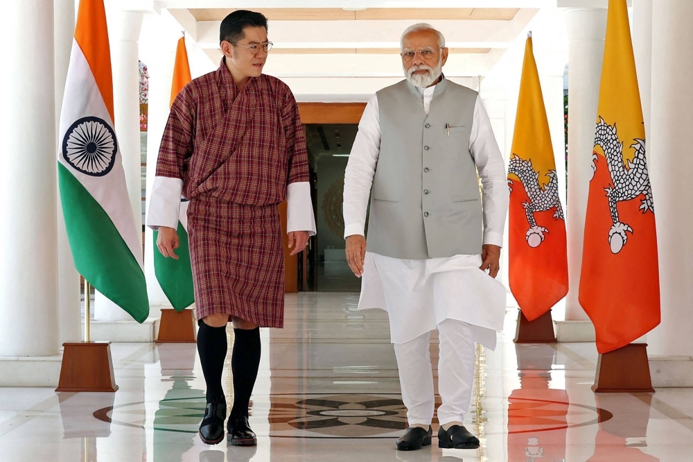 Bhutan's King Jigme Khesar Namgyel Wangchuck (left) walking along with India's Prime Minister Narendra Modi during their meeting in New Delhi in April. Bhutan's King Jigme Khesar Namgyel Wangchuck (left) walking along with India's Prime Minister Narendra Modi during their meeting in New Delhi in April.