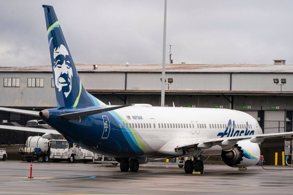 An Alaska Airlines Boeing 737 Max 9 is grounded at Seattle-Tacoma International Airport on Saturday. 