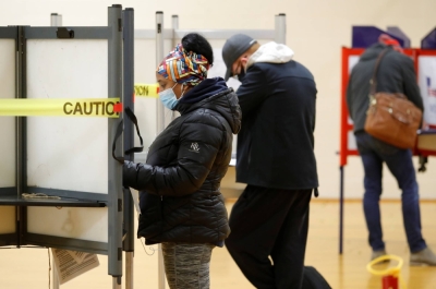 Voters cast ballots for the U.S. presidential election at a polling station in Portland, Maine, on Nov. 3, 2020.
