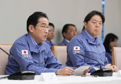 Prime Minister Fumio Kishida attends a meeting at the disaster response headquarters in Tokyo on Sunday.