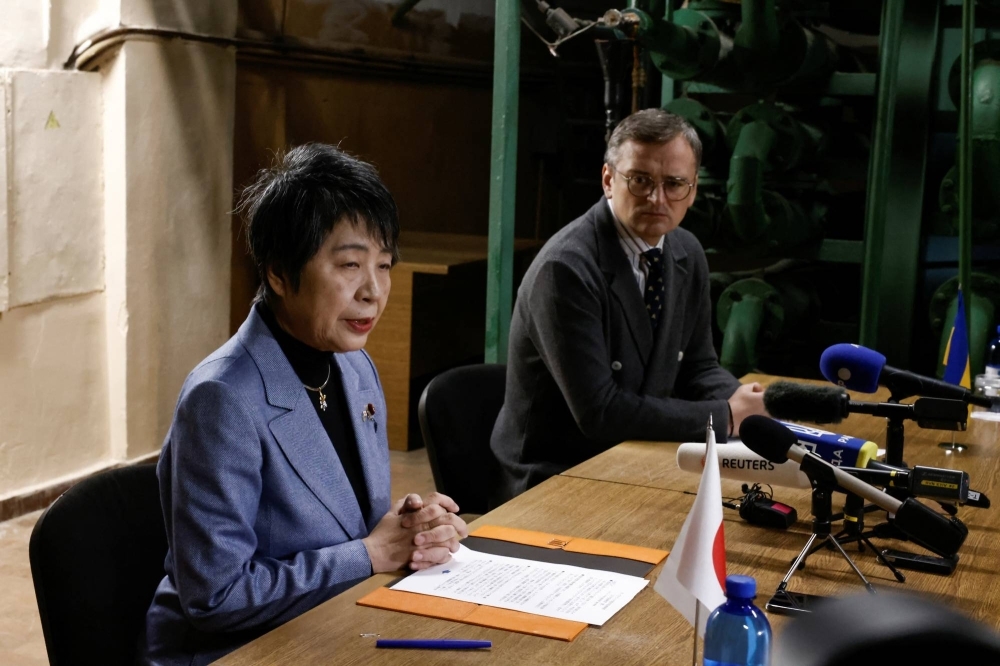 Foreign Minister Yoko Kamikawa and her Ukrainian counterpart, Dmytro Kuleba, hold a news conference in a bomb shelter in Kyiv, amid Russia’s attack on Ukraine, on Sunday.