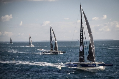 French skipper Armel Le Cleac'h sails his Banque Populaire Ultim multihull (foreground) after the start of the Arkea Ultim Challenge, a solo round-the-world race on a multihull, off the coast of Brest on Sunday.