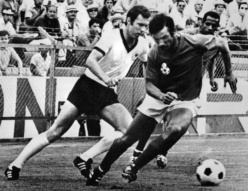 West German midfielder Franz Beckenbauer (left) fights for the ball with Moroccan Benkhrif Boujemaa during a World Cup first round soccer match in Leon, Mexico, in June 1970. Beckenbauer died age 78 on Sunday.