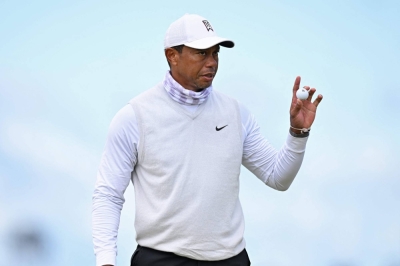 U.S. golfer Tiger Woods reacts on the 9th green on day 2 of the British Open Golf Championship in 2022. 