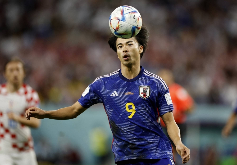 Kaoru Mitoma in action during the World Cup in Qatar in December 2022. Mitoma's availability for the Asian Cup, which begins Friday, is uncertain due to an injury. 