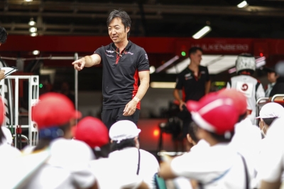 Ayao Komatsu speaks during an event ahead of the Japanese Grand Prix at Suzuka Circuit in Mie Prefecture on Sept. 21. 