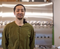 Hiromi Uetake founded his craft beer brewery, Brassiere Knot, inside a shuttered elementary school in eastern Hokkaido. | JUSTIN RANDALL
