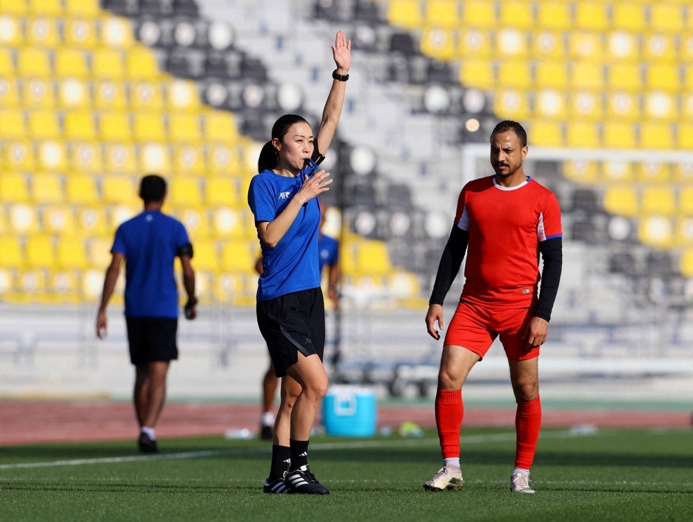 Yoshimi Yamashita is set to become the first woman to referee at the men's Asian Cup on Saturday. 
