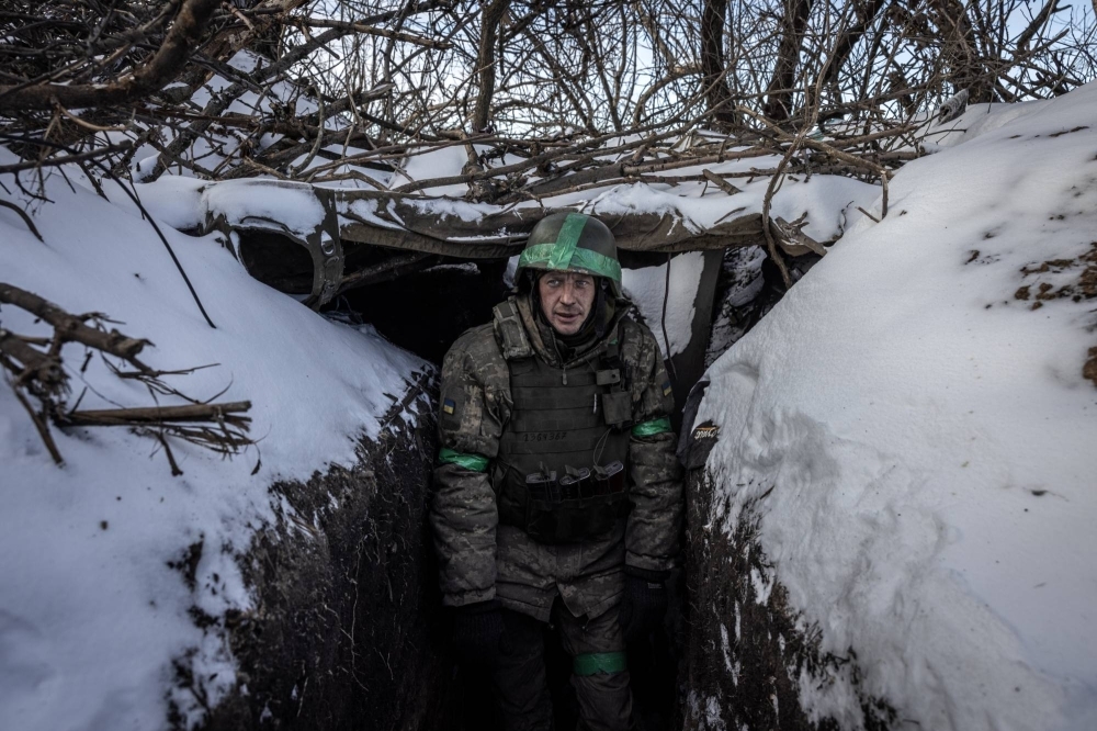 A Ukrainian soldier with the 68th Brigade in a trench that is about 500 yards from a Russian position, in the Luhansk region of Ukraine, on Tuesday. After a Ukrainian summer counteroffensive in the south that fell far short of objectives, and with Russian troops currently on the attack and Western military aid less assured than in the past, the country’s prospects are looking bleak.