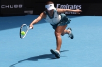 Japan's Mai Hontama hits a return against Czech Republic's Barbora Krejcikova during their first-round match at the Australian Open in Melbourne on Sunday.  | AFP-JIJI