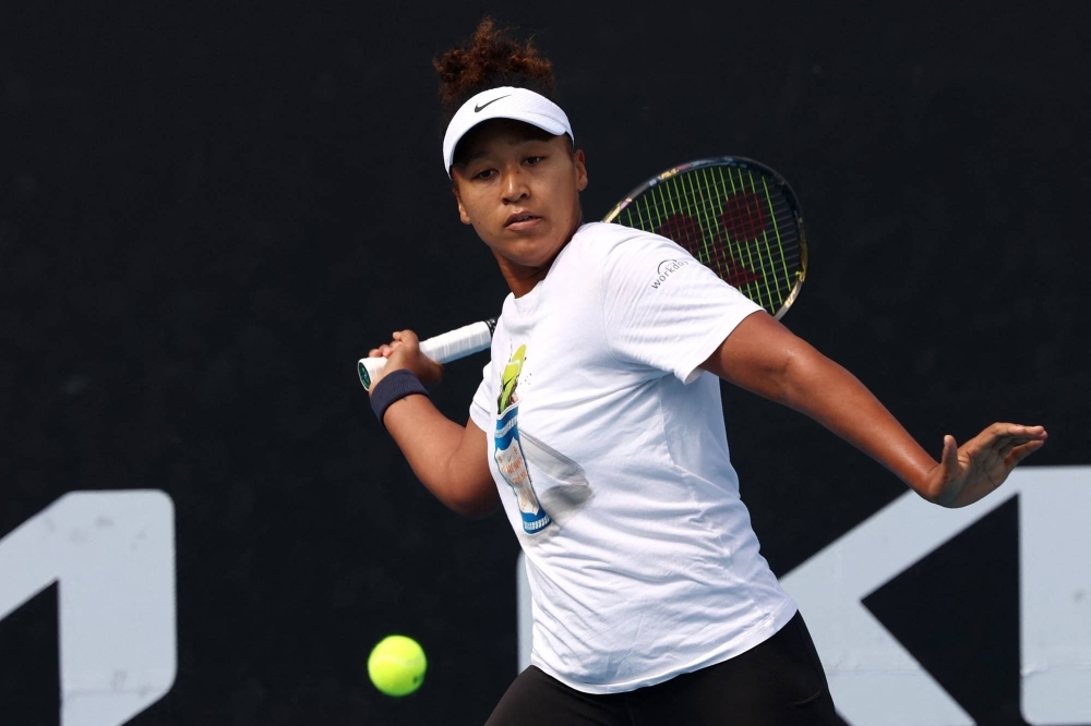 Naomi Osaka practices in Melbourne on Sunday ahead of her first-round clash against Caroline Garcia at the Australian Open on Monday.