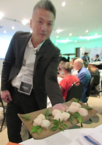 Scallops from Hokkaido are served at an event in Sao Paulo on Sunday to promote Japanese seafood. | Jiji