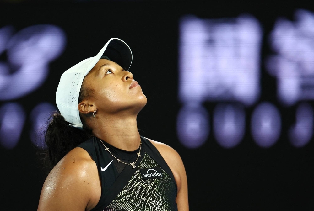 Japan's Naomi Osaka reacts during her first round match against France's Caroline Garcia at the Australian Open at Melbourne Park, Melbourne, on Monday.