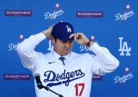 Two-way star Shohei Ohtani recently signed for the Los Angeles Dodgers, who will play the San Diego Padres in South Korea in March. | REUTERS