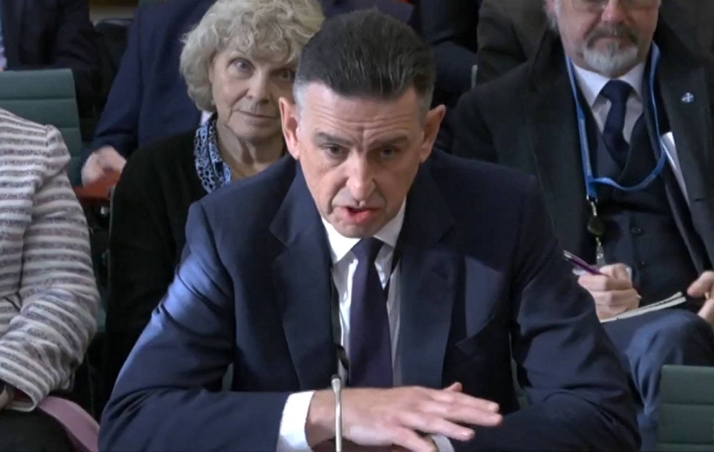 A video still shows current Fujitsu Services Director Paul Patterson giving evidence to a hearing of the Business and Trade Select Committee in the House of Commons, in London on Tuesday.