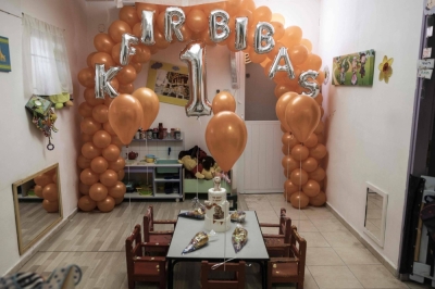 Birthday decorations and a cake with a picture one-year-old hostage Kfir Bibas, the youngest hostage to be kidnapped by Hamas militants, together with his mother and brother, in the Oct. 7 attack in southern Israel, at a nursery in kibbutz Nir Oz, Israel, on Tuesday.