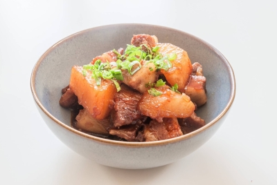 The recipe combines daikon with pork belly for a traditional style simmered dish with a twist.