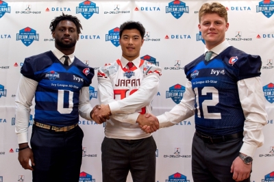 Japan captain Taku Lee with Ivy league players Alex Washington (left) and Nick Howard in Tokyo on Tuesday ahead of the Dream Japan Bowl.
