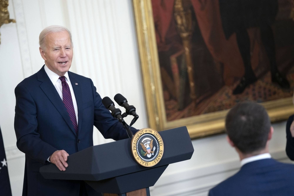 U.S. President Joe Biden speaks in the East Room of the White House during an event to welcome mayors attending the U.S. Conference of Mayors Winter Meeting in Washington, on Friday. 