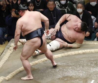 Shodai (left) turned back the clock with an upset win over lone yokozuna Terunofuji on Saturday in Tokyo. 