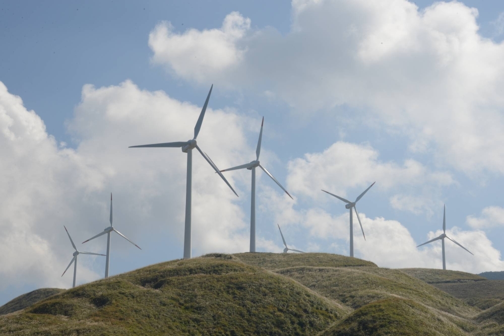 Wind turbines at a wind farm in the village of Nishihara, Kumamoto Prefecture. New wind projects continue to be announced as Japan moves forward to meet its goal of having the renewable resource make up 5% of its energy mix by 2030. 