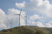 Wind turbines at a wind farm in the village of Nishihara, Kumamoto Prefecture. New wind projects continue to be announced as Japan moves forward to meet its goal of having the renewable resource make up 5% of its energy mix by 2030.  | Jiji
