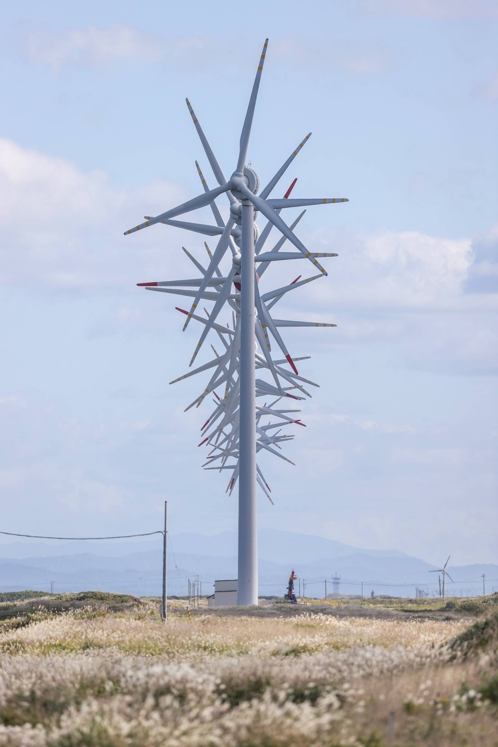 A row of wind turbines at Otonrui wind farm in the town of Horonobe, Hokkaido