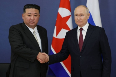 Russian President Vladimir Putin and North Korean leader Kim Jong Un shake hands during their meeting at the Vostochny Cosmodrome in Russia's Amur region on Sept. 13.
